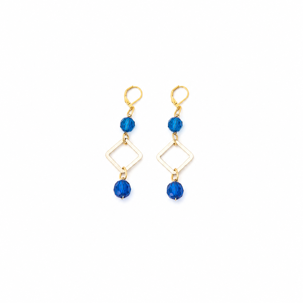 Aretes Blue Gem con Cristales Azules Facetados y Marco Geométrico Dorado